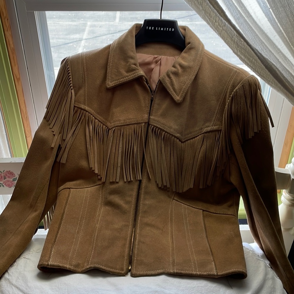 Vintage fully lined suede jacket in excellent shape.